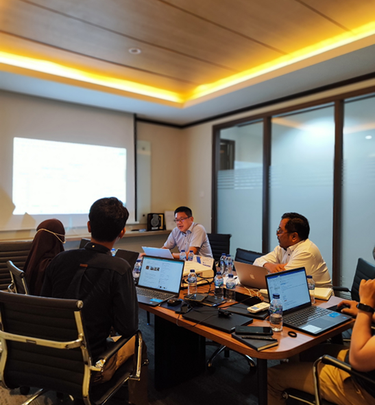 Ascentia team meeting with a client in a meeting room